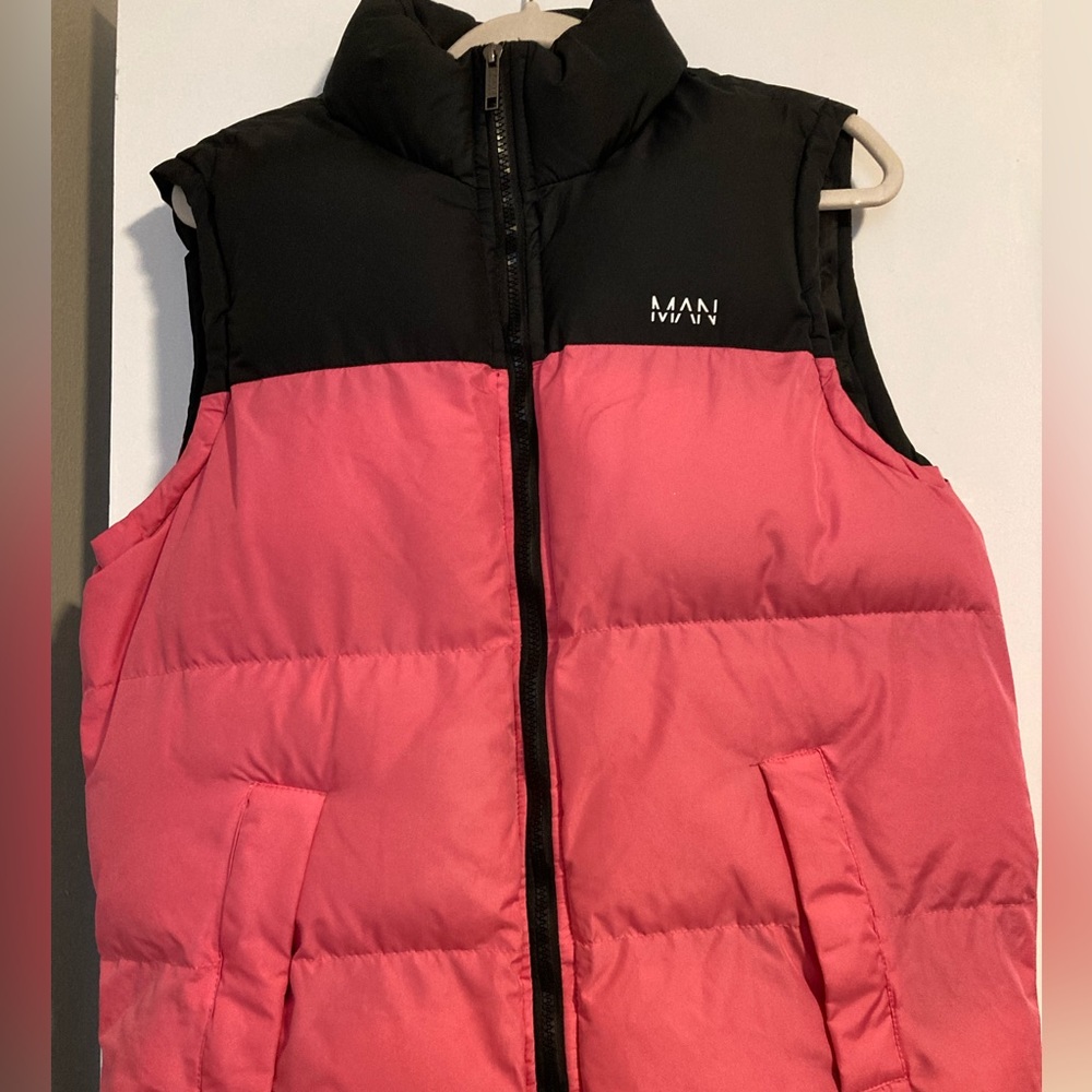I am selling a Large pink and black BooHoo vest.